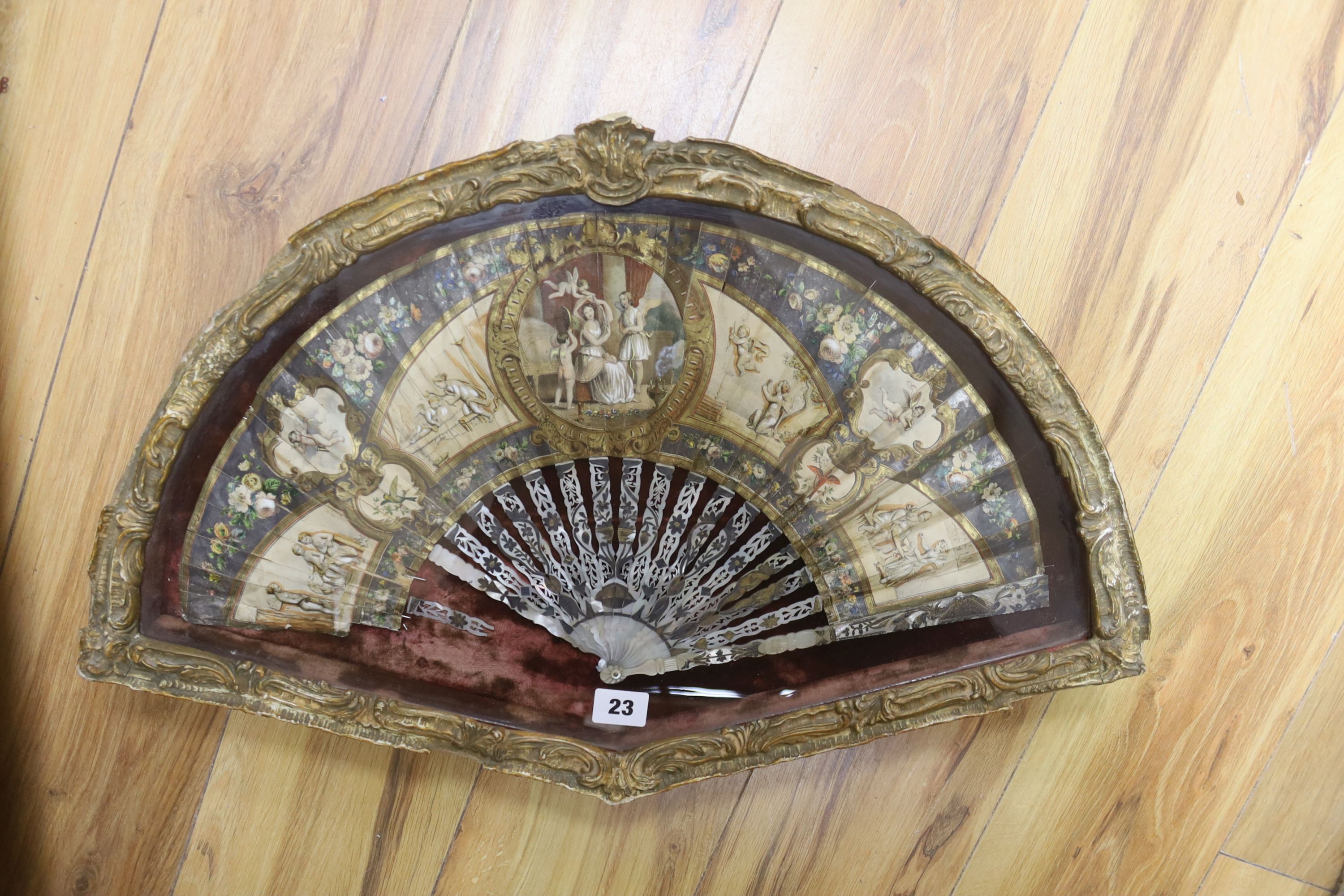 TO BE COLLECTED BY VENDOR Two late 18th/19th century French gesso framed fans with mother of pearl inlaid ivory sticks and guards with hand painted cartouche of classical figures and landscape on the fan leaves, length o